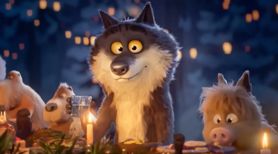 Loup de la pub intermarché, le mal aimé pendant le repas de fin avec les autre animaux, il leve son verre avec un sourire.