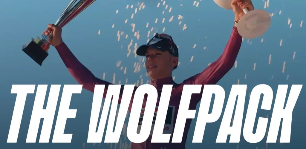Cycliste brandissant un trophée sous le titre The Wolfpack , illustration du loup dans le sport.